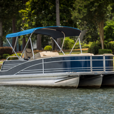 Blue pontoon boat on the water in Florida