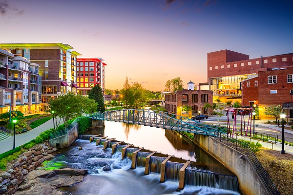 Buildings and river at dusk